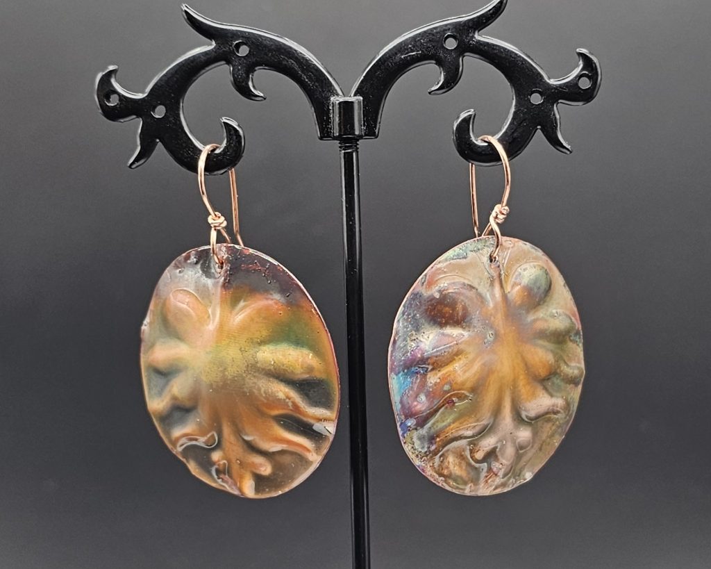 Dangle copper disc earrings embossed and flame painted on hand made copper earring wires