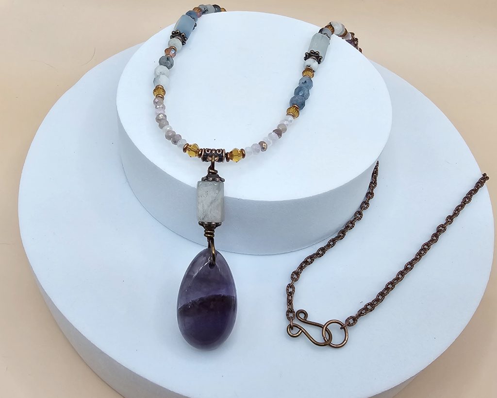 Handmade necklace with amethyst teardrop pendant, aquamarine beads, crystals, copper chain and hook clasp