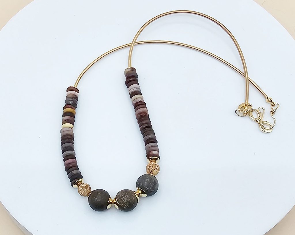 Handmade 17–18 inch necklace with Bronzite, Agate, and Mookaite beads, gold stainless steel accents, and a handmade hook clasp.