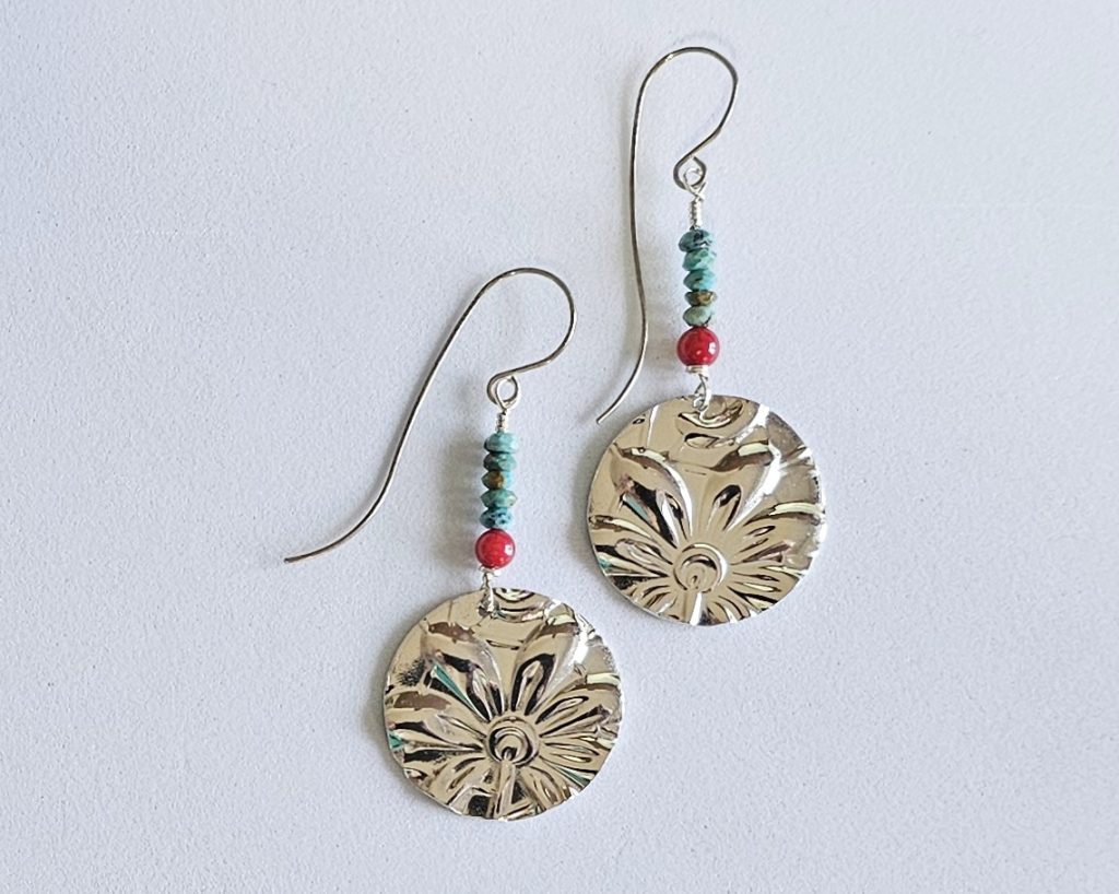 Handmade turquoise, red coral and embossed pewter earrings with Argentium silver ear wires. Lightweight 2-inch artisan dangle earrings.