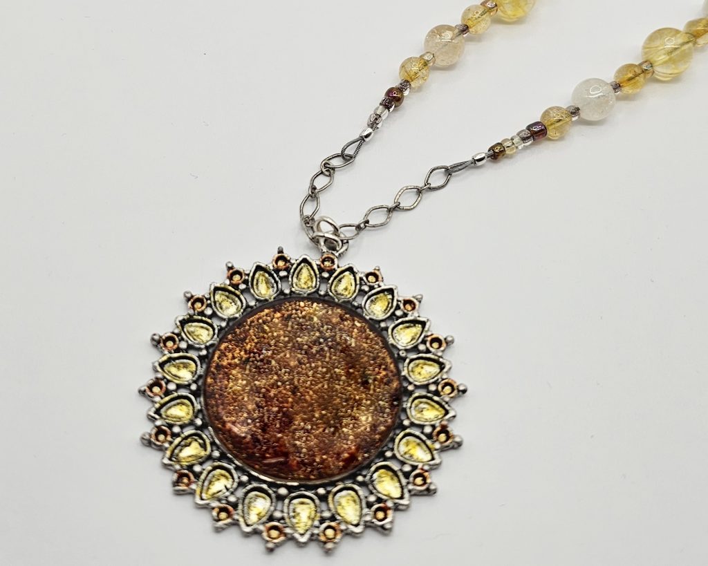 Handmade citrine necklace with antique silver resin pendant, hand colored with alcohol ink and accented with glass seed beads.