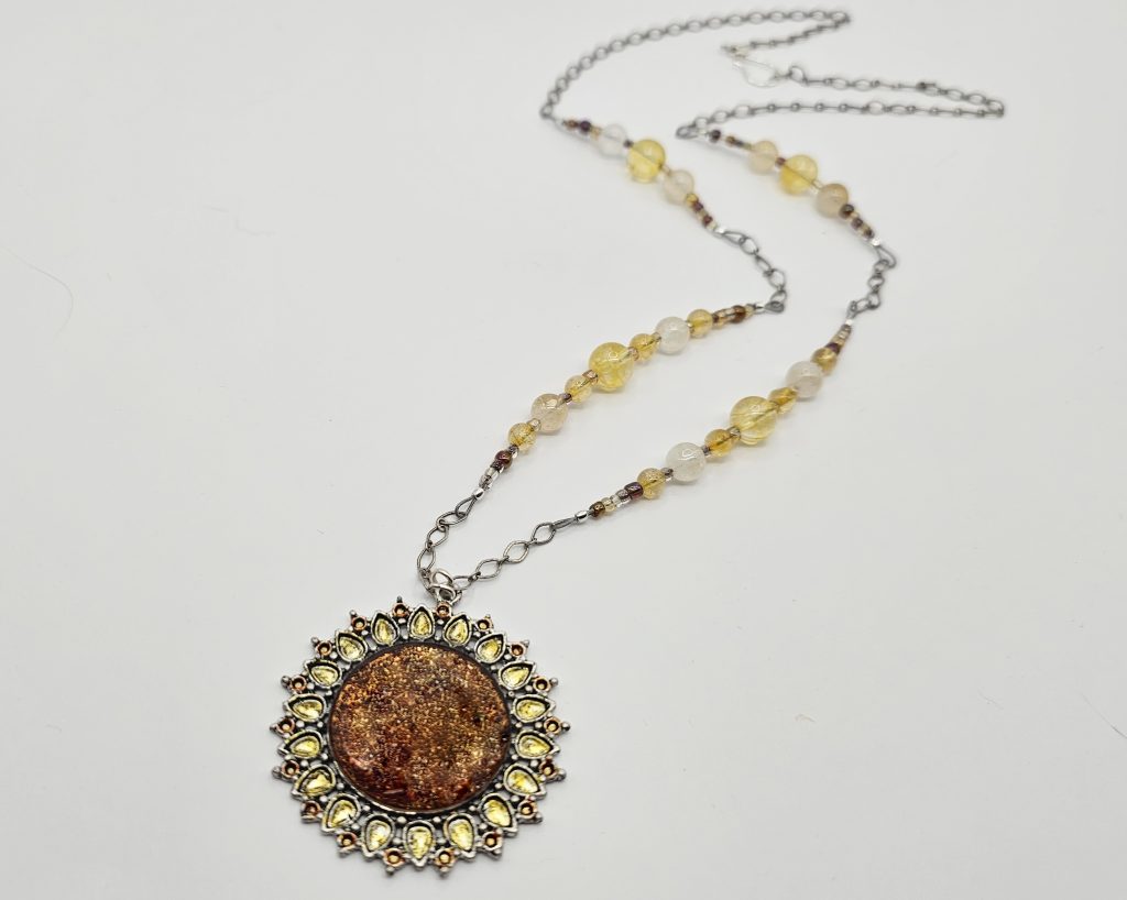 Handmade citrine necklace with antique silver resin pendant, hand colored with alcohol ink and accented with glass seed beads.